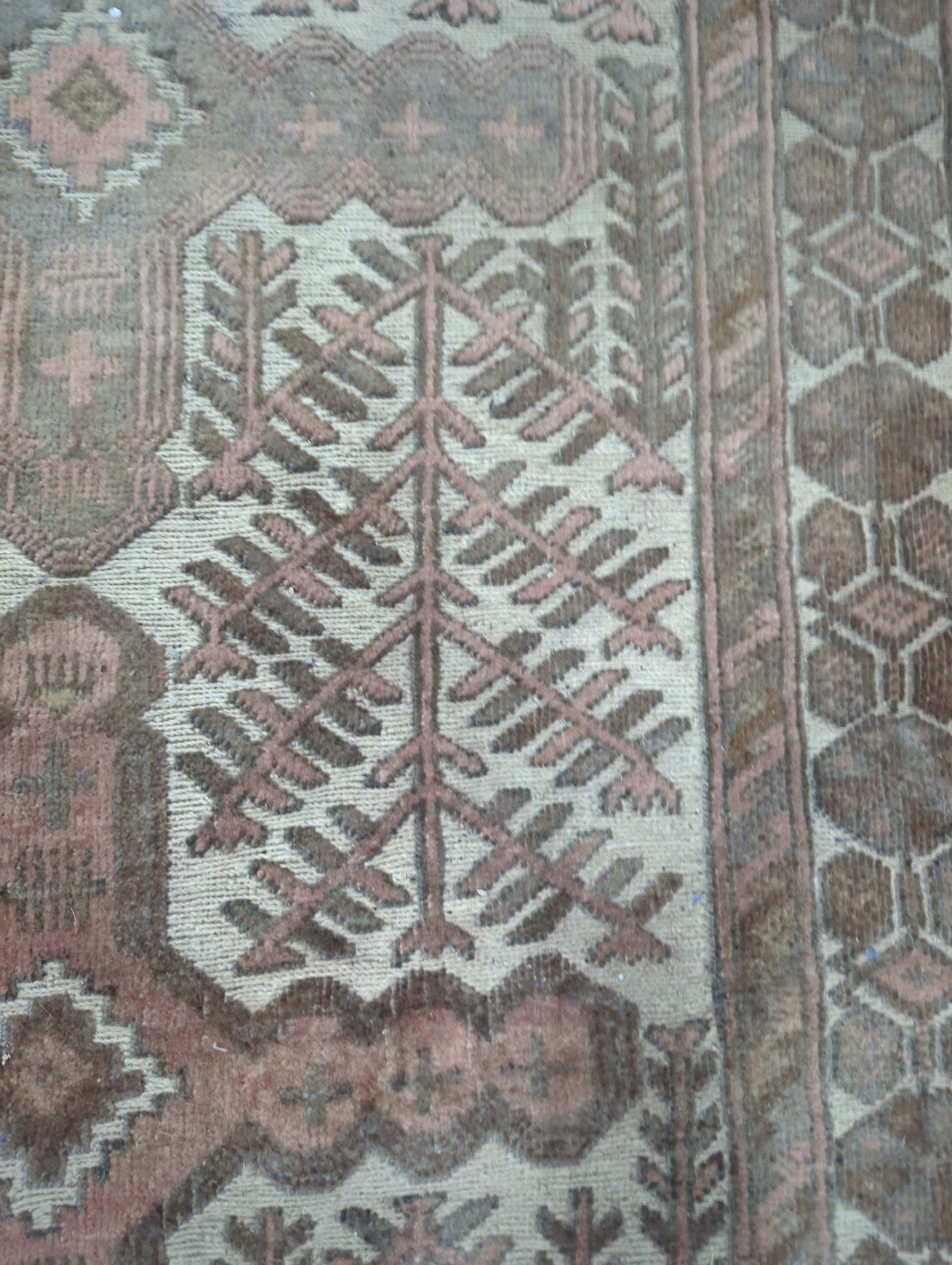 An ivory ground Afghan runner, 370 x 93cm